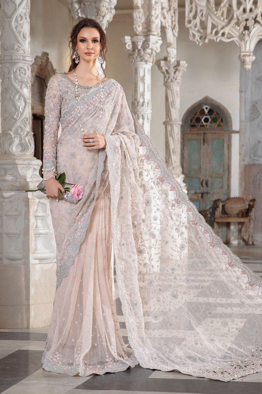 Maria B pale pink net saree with organza blouse and tissue petticoat