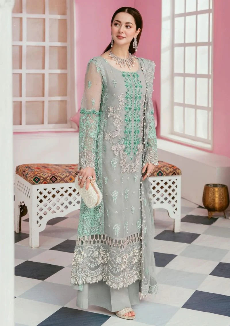Sage green organza suit side view with embroidered daman border